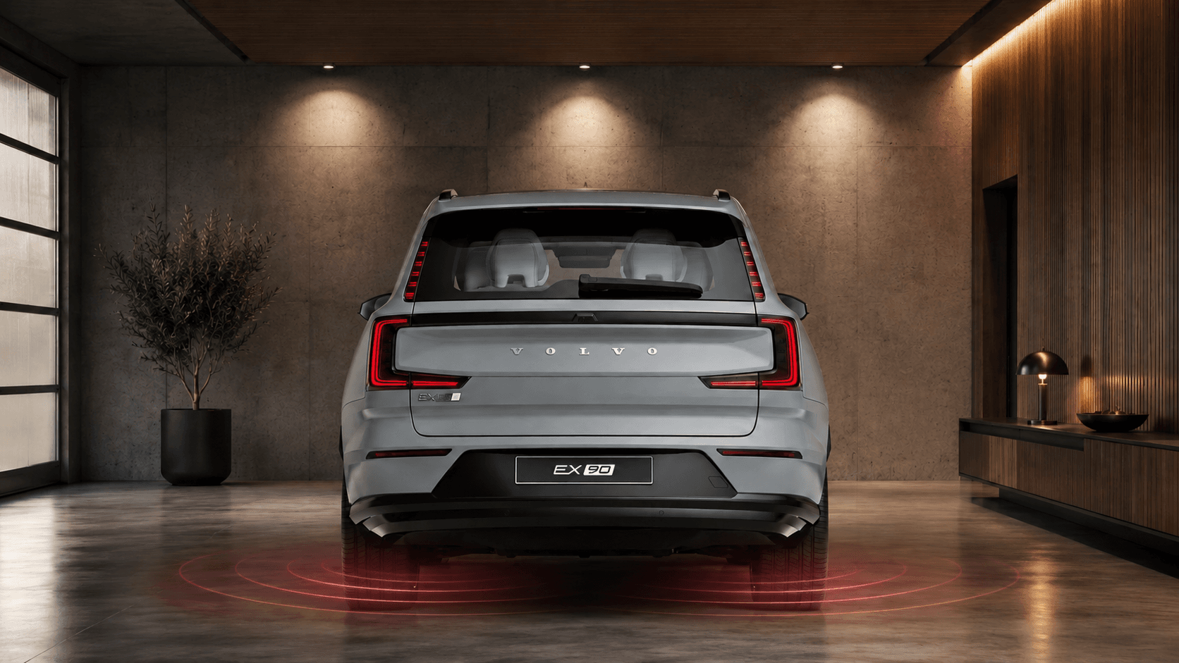Volvo estacionado em uma garagem com sensores de estacionamento traseiros ativos